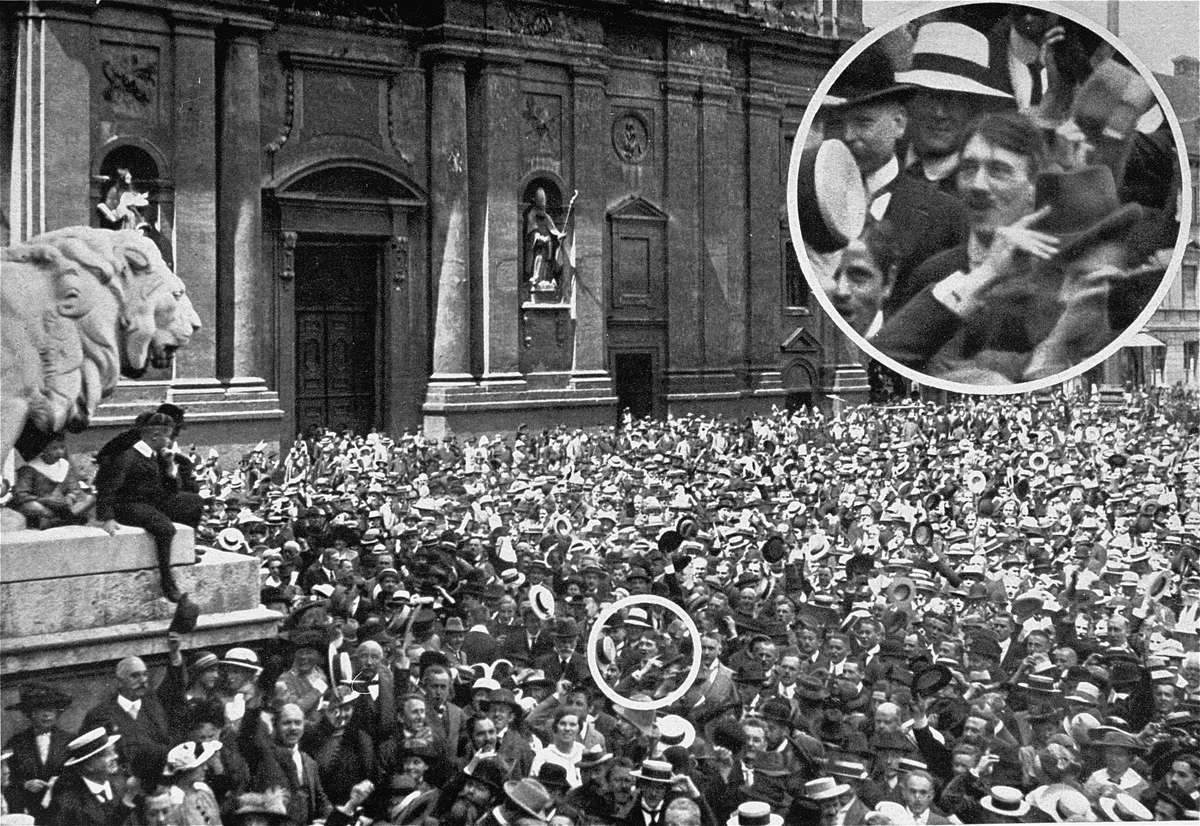 At the outbreak of WW1, Hitler participates in a rally at Munich's Odeonsplatz. Heinrich Hoffmann covered the event and discovered several years later that Hitler was on the photo (although there are doubts that it may have been edited for propaganda)